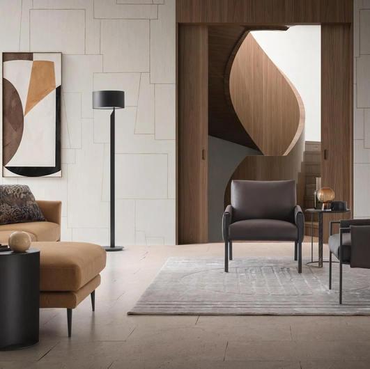 Poltroncina Andy in ecopelle con struttura in metallo di Le Comfort