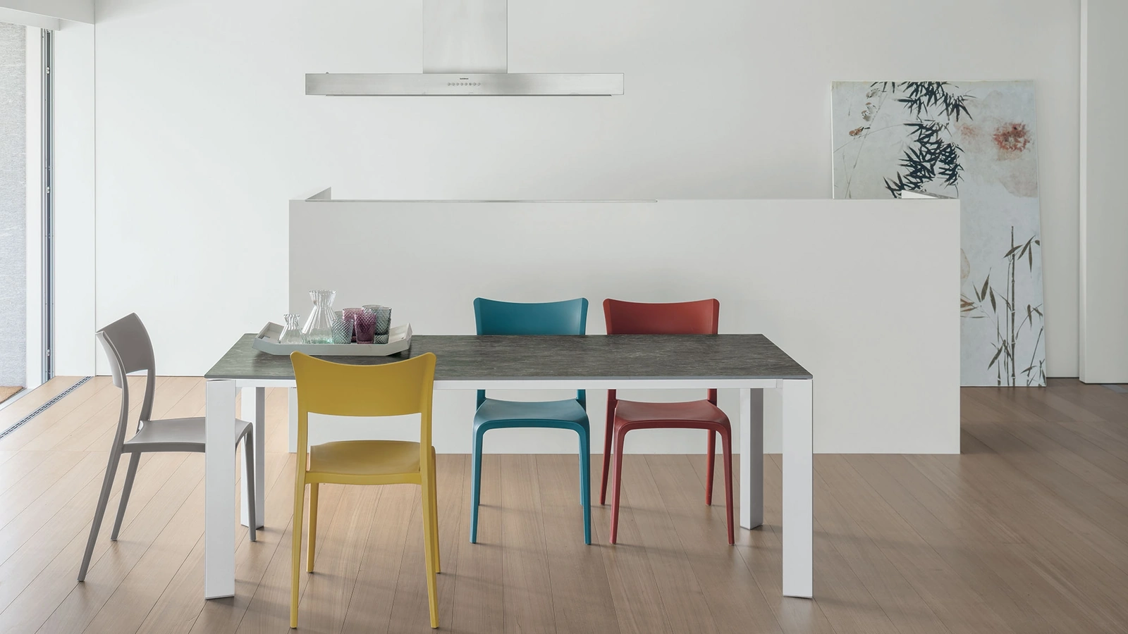 Tavolo allungabile Saturno con piano in gres porcellanato e gambe in metallo di Target Point